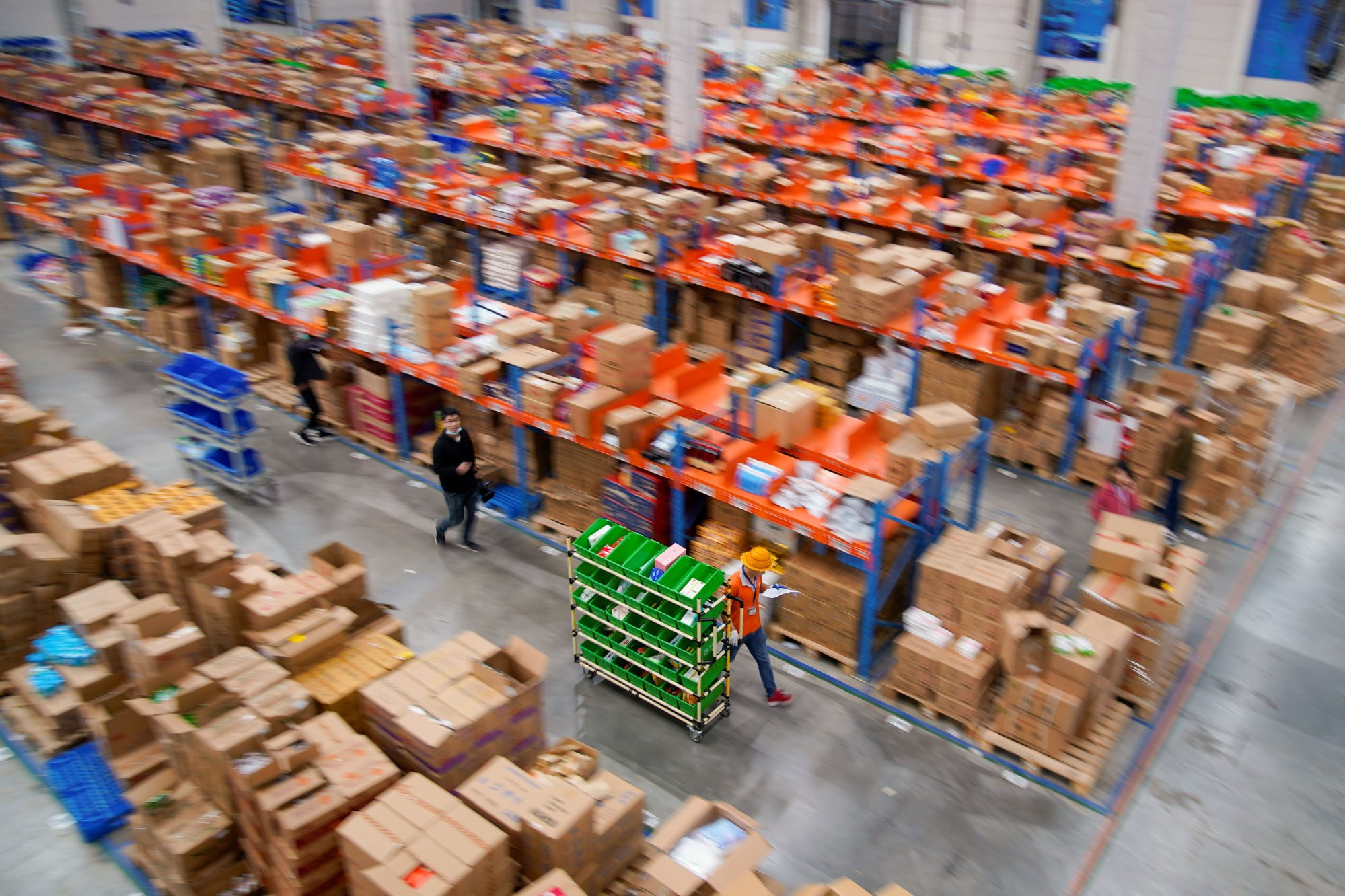 Employees work at a warehouse of Cainiao, Alibaba’s logistics unit, in Wuxi, Jiangsu province, China on October 26, 2020. Photo: Reuters