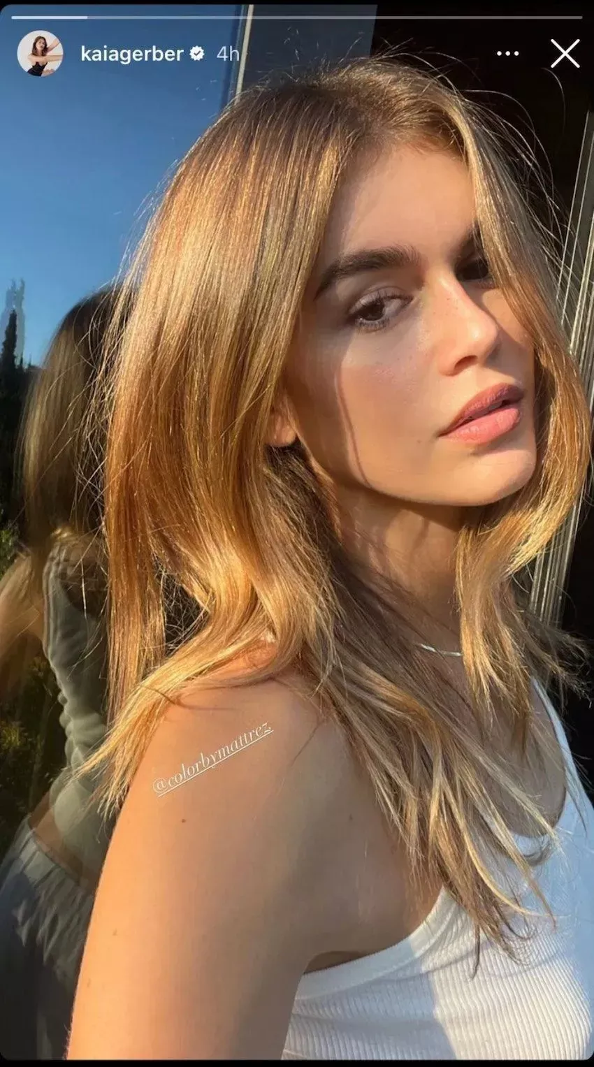 Kaia Gerber poses with new blonde hair